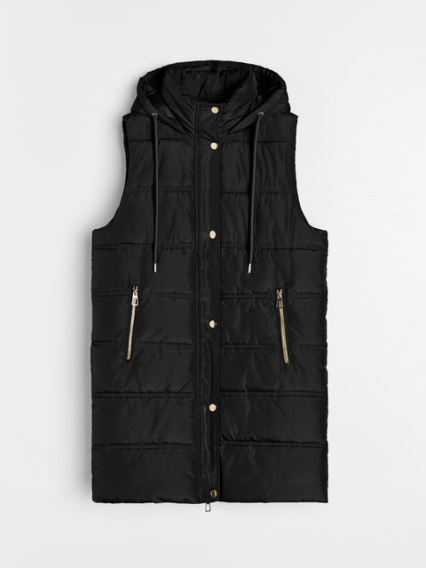 Black puffer vest with zippers and buttons on a light gray background