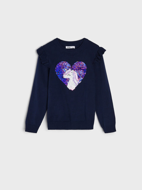 Navy blue sweater with a heart-shaped sequin design on a light gray background