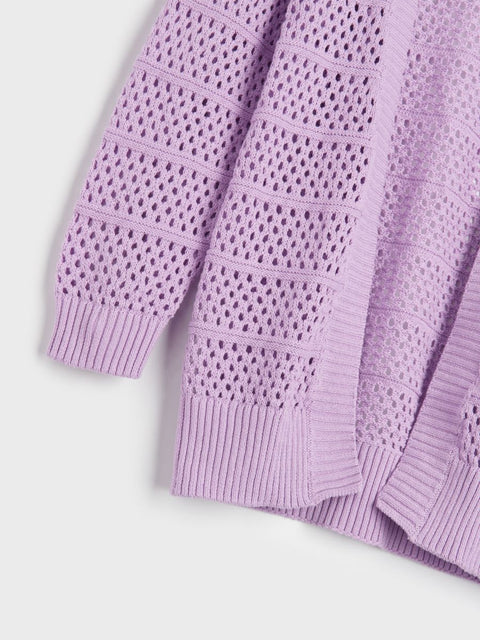 Close-up of a light purple knitted cardigan with openwork pattern on a white background