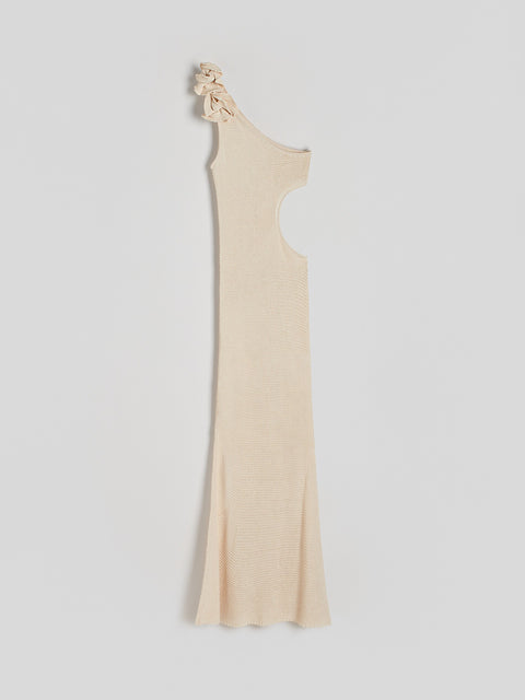 Beige one-shoulder dress on a light gray background