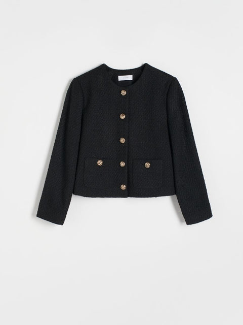 Black jacket with gold buttons on a light gray background