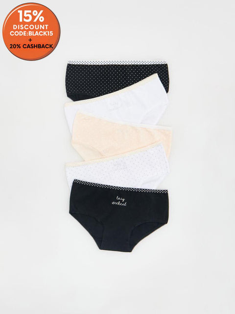 Set of women's underwear in various colors on a white background