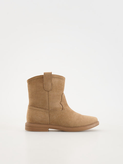 Tan ankle boot on a white background