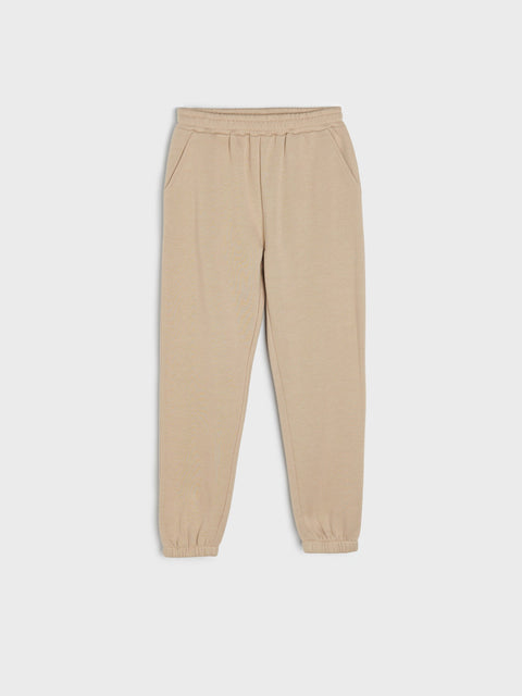 Beige sweatpants on a white background