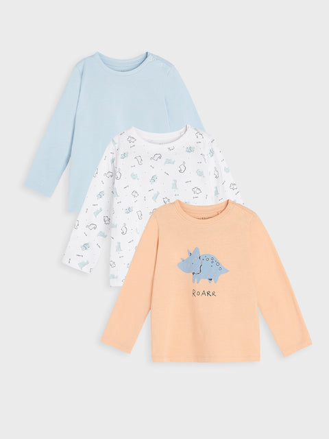 Three long-sleeve shirts in different colors with cartoon designs on a light gray background