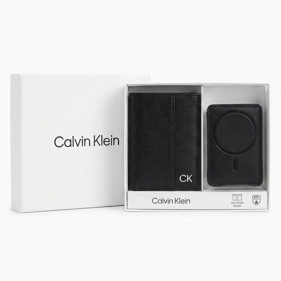 Calvin Klein black leather wallet and MagSafe-compatible case set in its white retail box, shown on a clean white background.