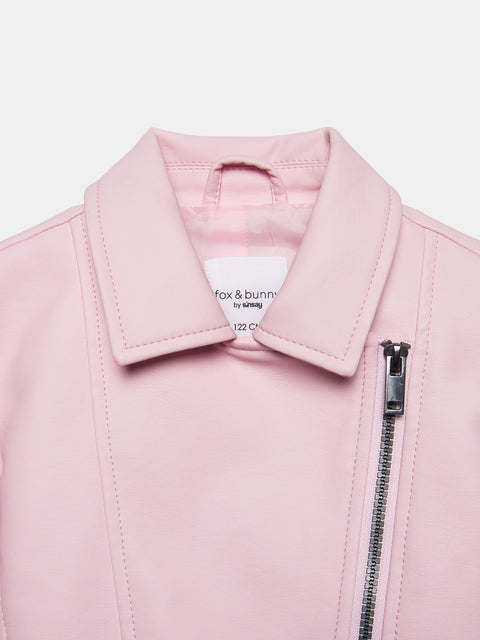 Close-up of a pink jacket with a brand label on a light gray background