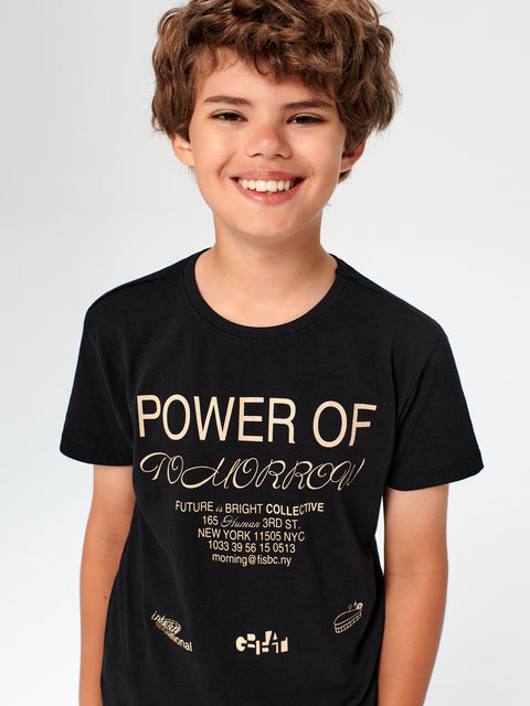 Child wearing a black t-shirt with text on a white background