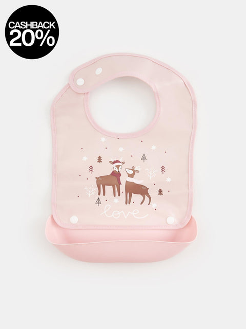 Pink baby bib with reindeer design on a white background