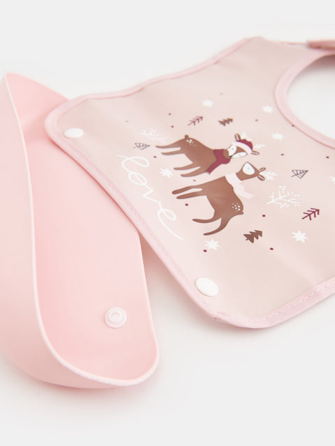 Pink bib with deer design on a white background