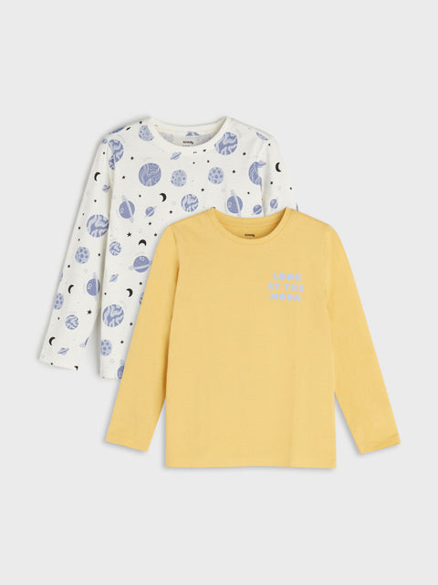 Two long-sleeve shirts, one with a space-themed pattern and the other yellow with text, on a light gray background.