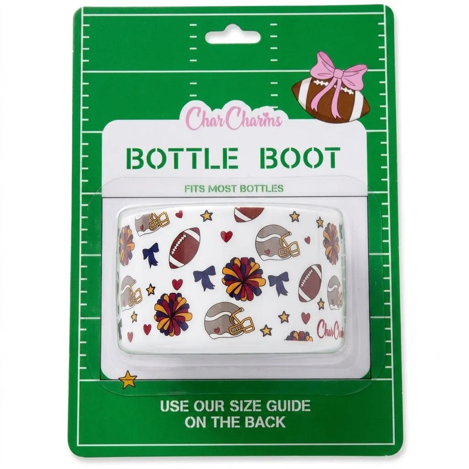 Char Charms 'Bottle Boot' elastic wristband in its retail packaging. The white wristband features a football-themed pattern with brown footballs, gold helmets, purple and orange pom-poms, and red hearts.