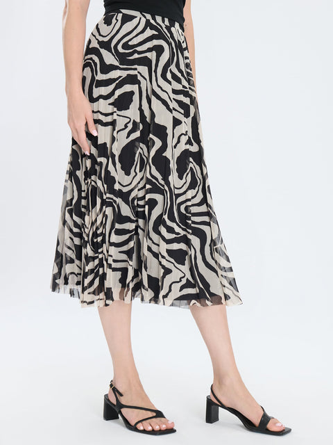 Skirt with zebra pattern worn by a person on a white background