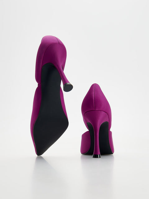 Purple high-heeled shoes on a white background