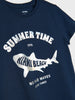 Navy blue t-shirt with white shark graphic and text on a white background