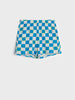 Blue and white checkered shorts on a light gray background