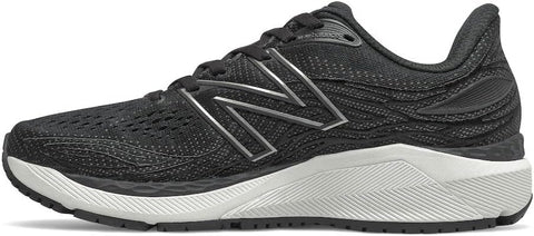 Black running shoe with New Balance logo on a light gray background
