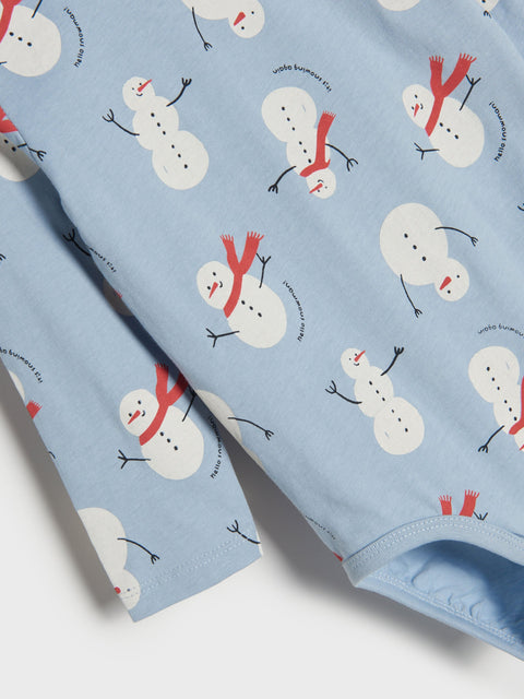 Light blue fabric with snowman pattern on a white background