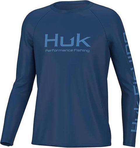 Blue long-sleeve shirt with Huk logo on a white background