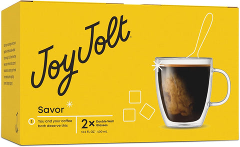 Joy Jolt coffee packaging with a yellow background and a glass mug of coffee.