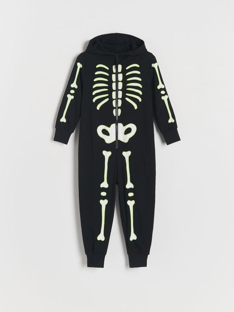 Black onesie with skeleton design on a light gray background
