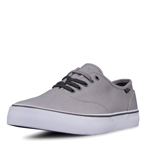 Gray sneaker with black laces on a white background