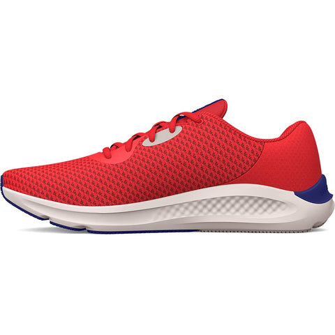 Red running shoe with white sole on a white background