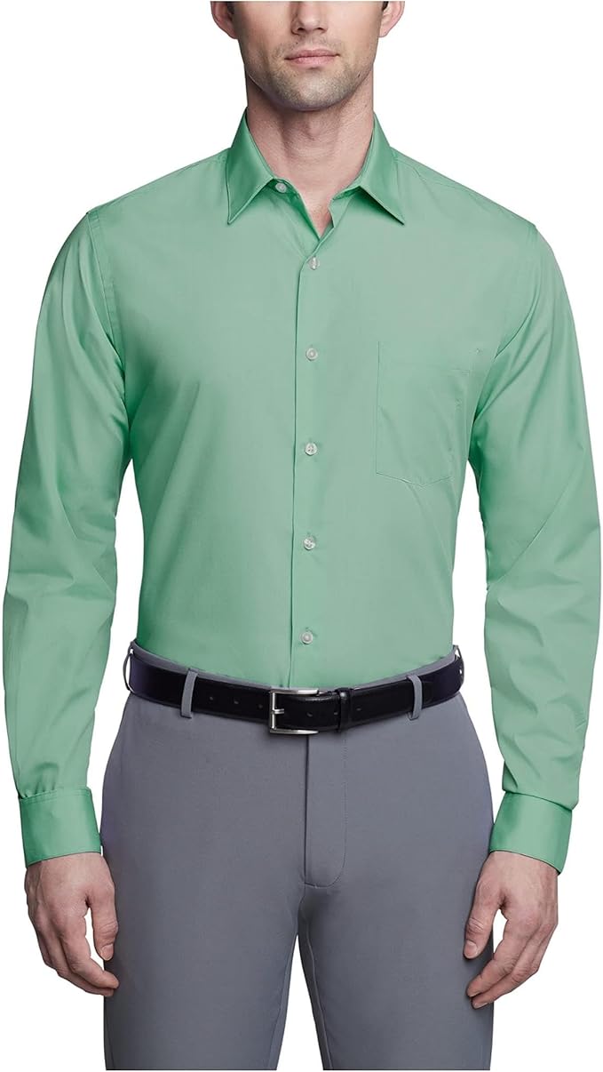 Man wearing a green dress shirt and gray pants on a white background