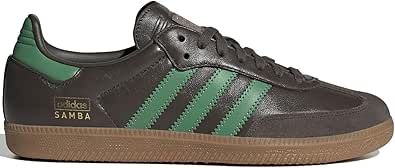 Dark gray Adidas Samba sneaker with green stripes on a white background