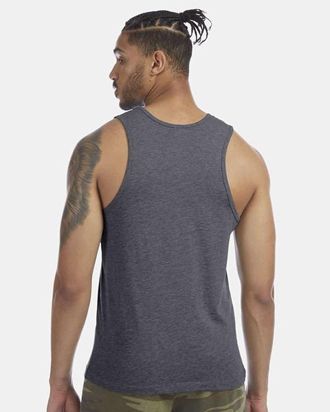 Man wearing a gray tank top on a plain background