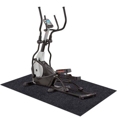 Elliptical trainer on a black mat with a white background