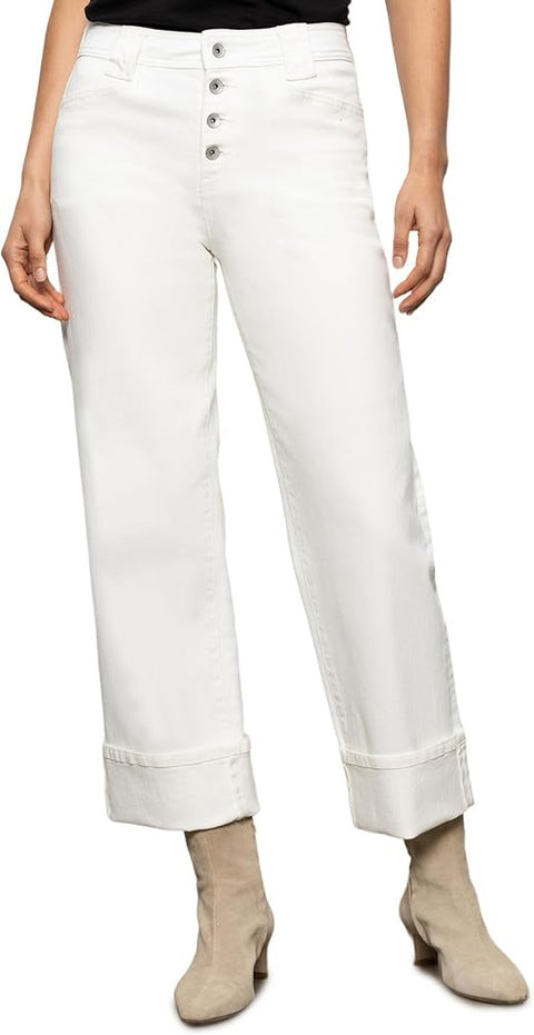 White jeans worn by a person on a white background