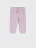 Pink ribbed pants on a white background