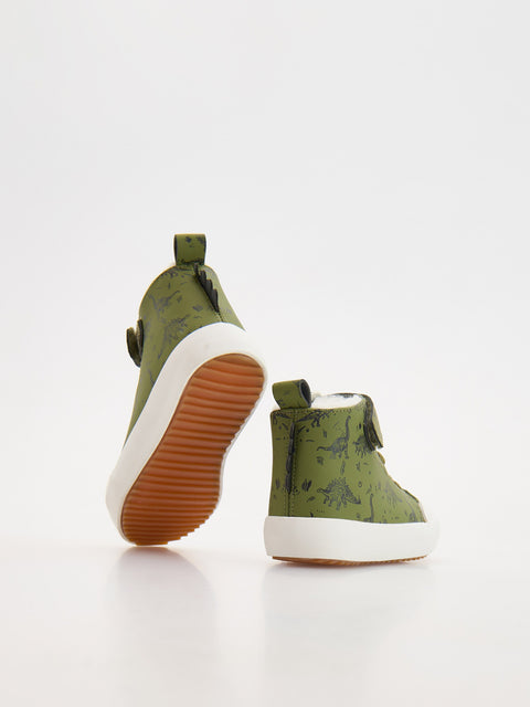 Green high-top sneakers with brown soles on a white background