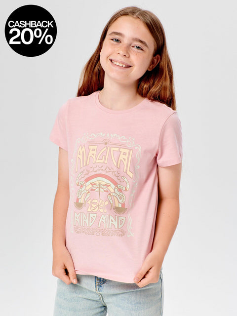 Young girl wearing a pink t-shirt with a graphic design on a plain background