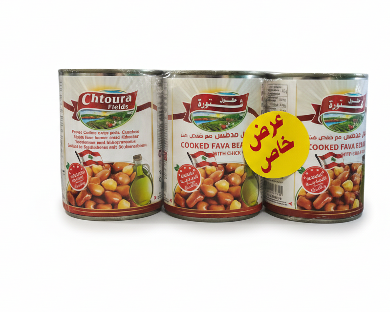 Three cans of Chtoura Fields cooked fava beans with chickpeas, labeled in Arabic.