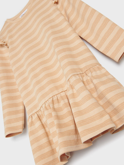 Beige and white striped dress with ruffled skirt on a white background