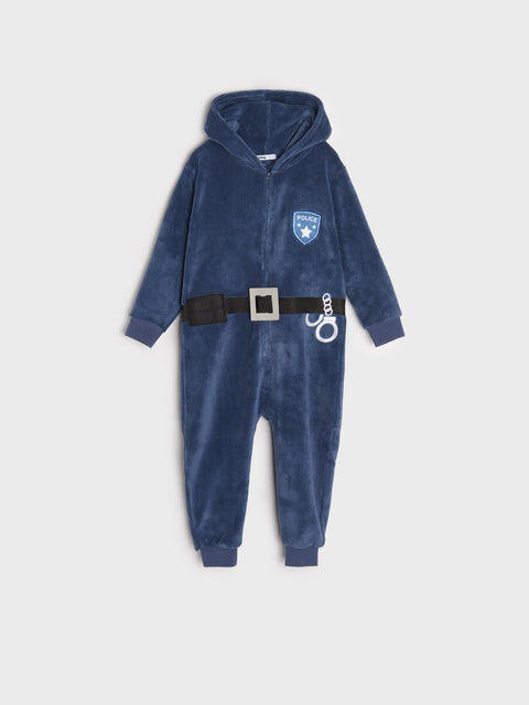 Blue children's onesie with a belt and badge on a light gray background