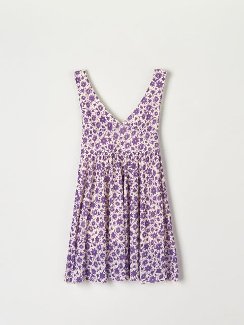 Purple floral dress on a white background