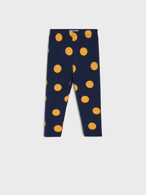 Navy leggings with orange polka dots on a white background