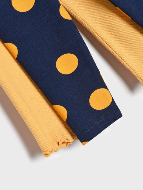 Navy fabric with yellow polka dots and plain yellow fabric on a white background