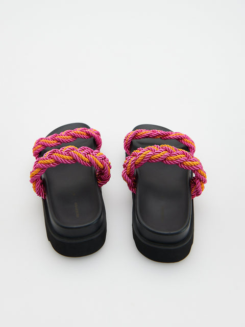 Pair of black sandals with colorful rope straps on a white background