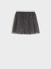 Black tulle skirt on a white background