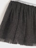 Black tulle skirt on a white background