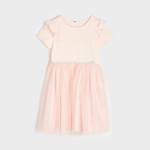 Pink dress on a light gray background