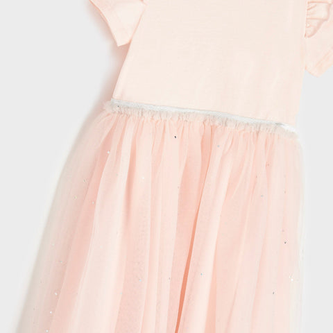 Light pink tulle skirt on a white background