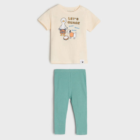 Children's t-shirt with graphic design and green leggings on a white background