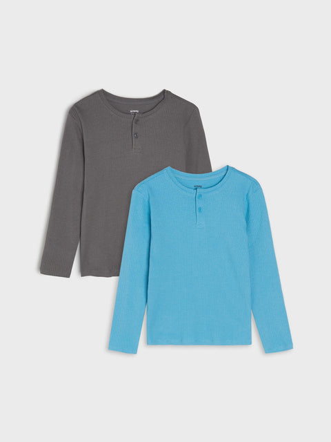 Two long-sleeve shirts, one gray and one blue, on a light gray background.