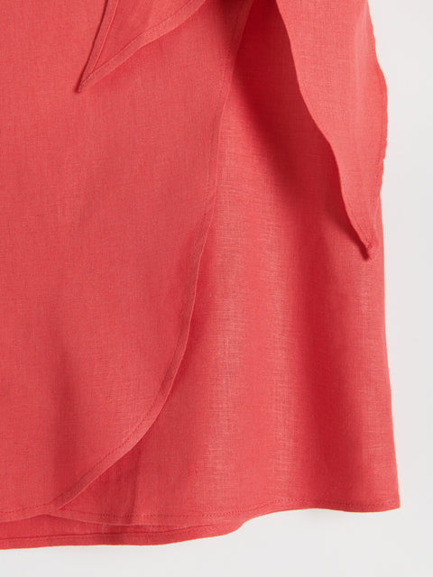 Close-up of a red fabric texture on a white background