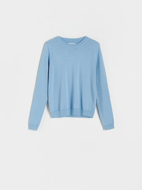 Light blue sweater on a light gray background